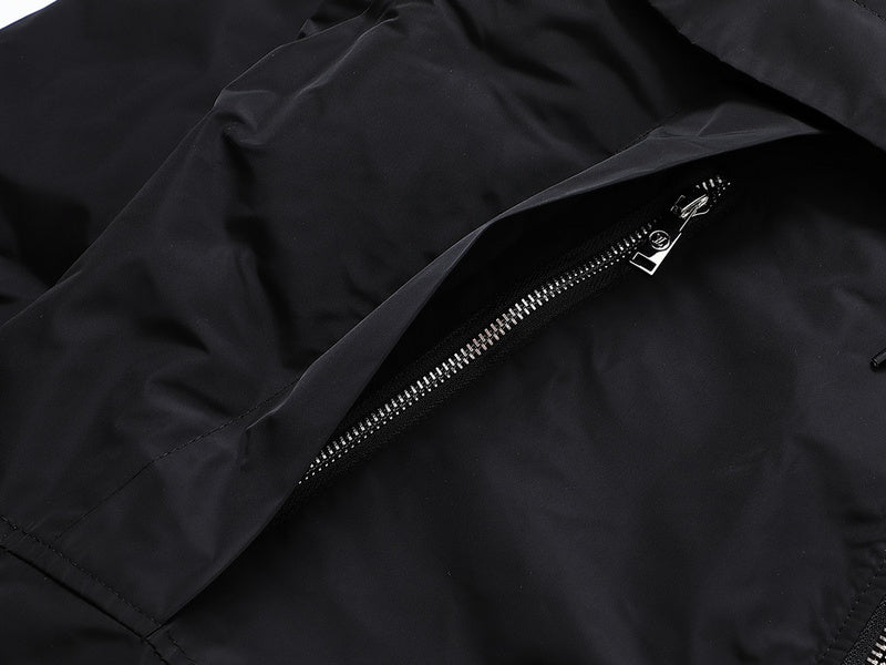 Flat lay presentation of Louis Vuitton luxury clothing with monogram-inspired silhouette