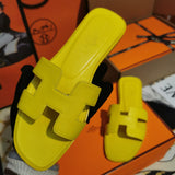 Hermès Beige Flat Thong Sandals - Front View