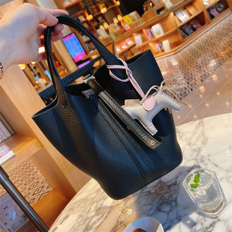 Side view of elegant structured handbag