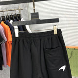 Back view of Rhude luxury clothing with label-forward styling