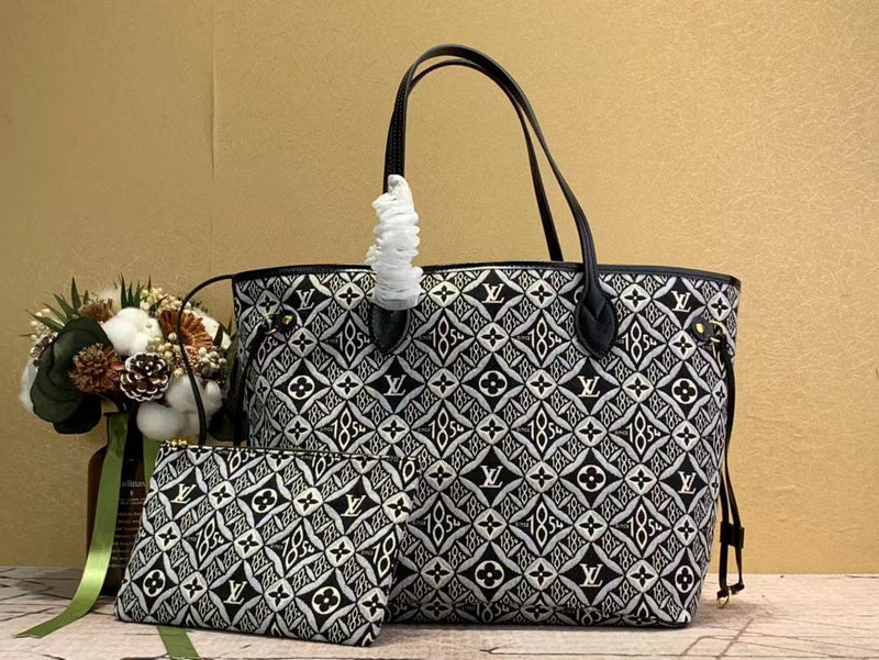 Side profile of polished statement women's handbag – women's luxury handbag