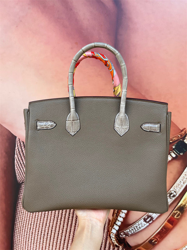 Side view of effortless structured handbag