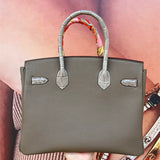 Side view of effortless structured handbag