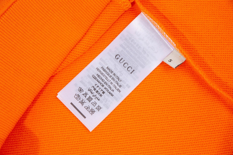 Close-up detail shot of Gucci luxury clothing with everyday silhouette