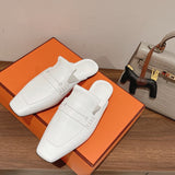 Hermès White High-Top Sneakers - Close-Up Texture View