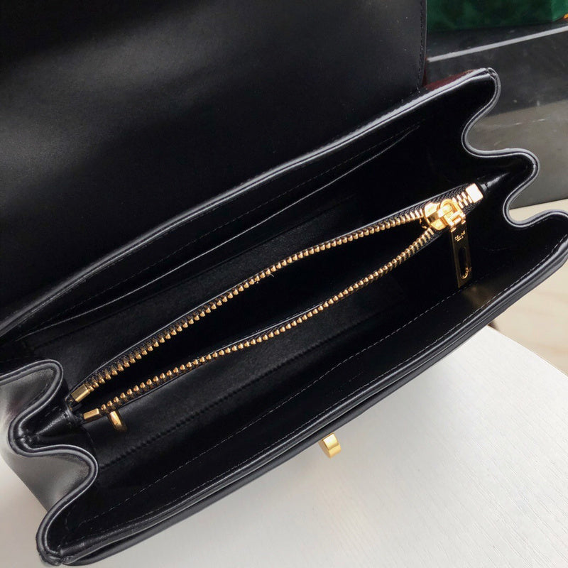 Side profile of modern classic women's handbag – women's designer-style accessory