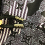 Flat lay presentation of Louis Vuitton cotton t-shirt with runway-inspired design