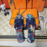 Hermès Chocolate Brown Crisscross Strap Sandals - Angled View