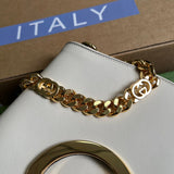 Handle and strap detail of signature modern women's handbag – women's statement bag