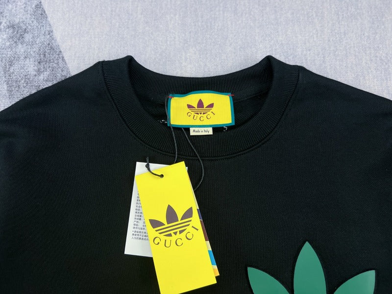 Close-up detail shot of Gucci luxury clothing with signature branding