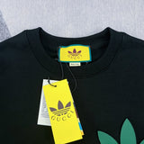 Close-up detail shot of Gucci luxury clothing with signature branding