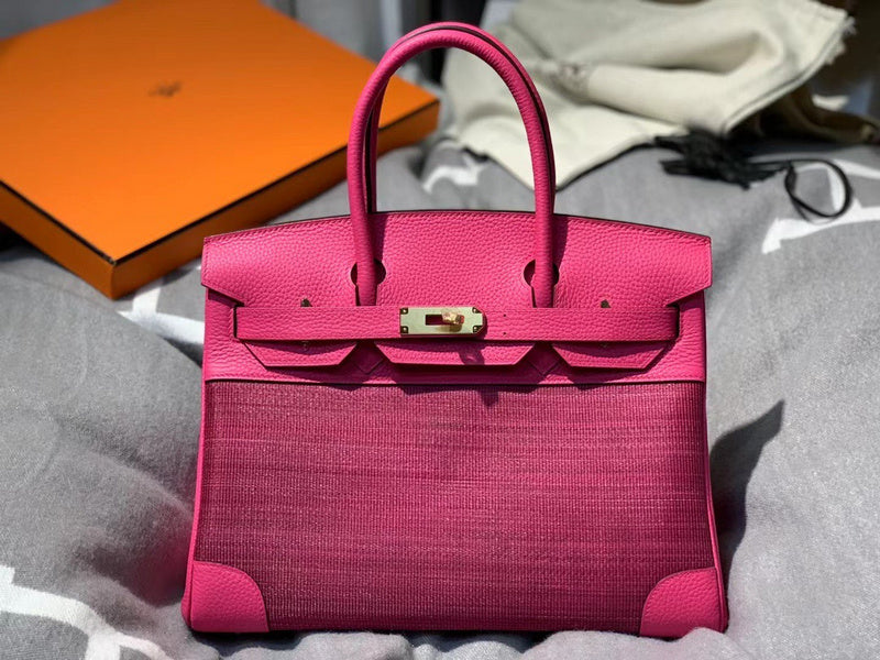 Side view of refined structured handbag