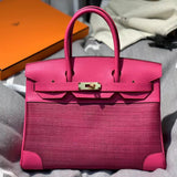 Side view of refined structured handbag