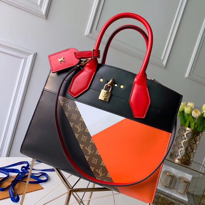 Side profile of polished everyday-luxe women's handbag – women's statement bag