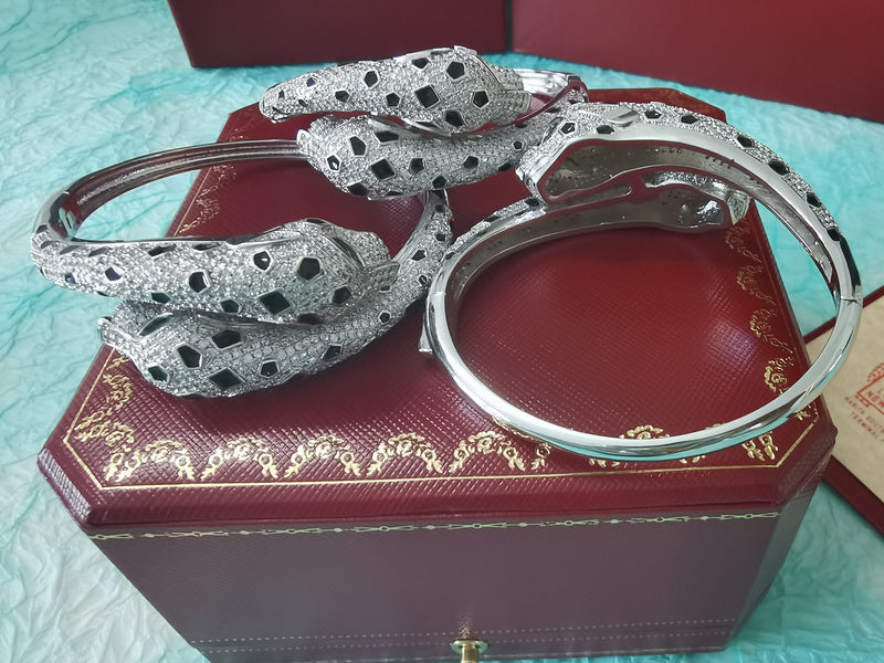 Front view of Cartier unisex jewelry piece