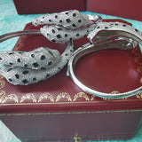 Front view of Cartier unisex jewelry piece