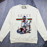 Front view of Gucci luxury clothing with signature branding