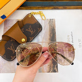 Angled view of Louis Vuitton unisex sunglasses