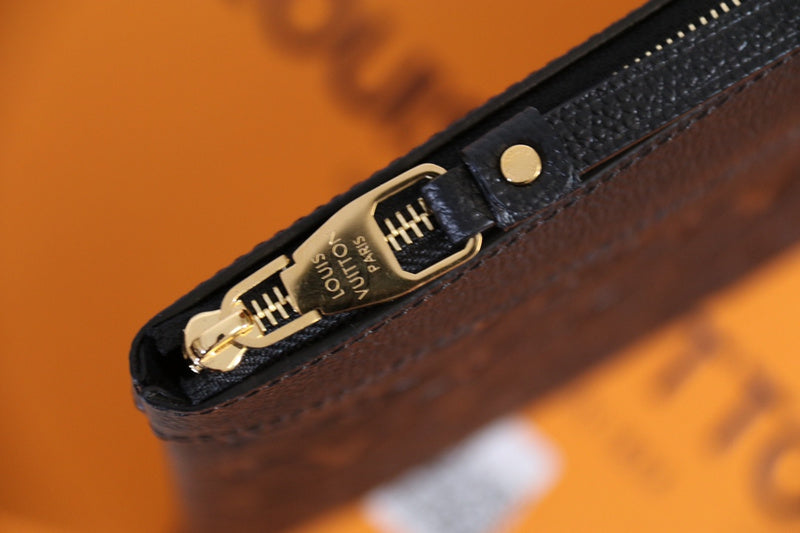 Side profile of signature sleek women's handbag – women's statement bag