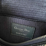 Handle and strap detail of polished refined women's handbag – women's designer-style accessory