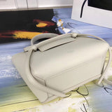 Handle and strap detail of everyday-luxe modern women's handbag – women's designer-style accessory