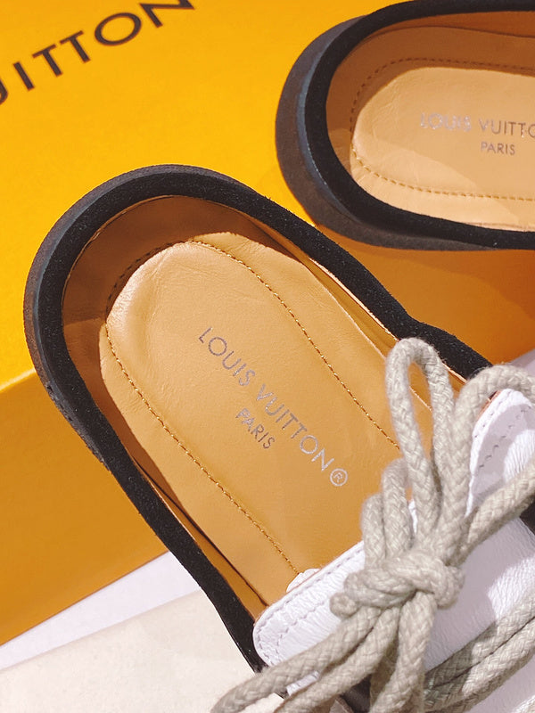 Louis Vuitton Black Pointed-Toe Flats - Back View