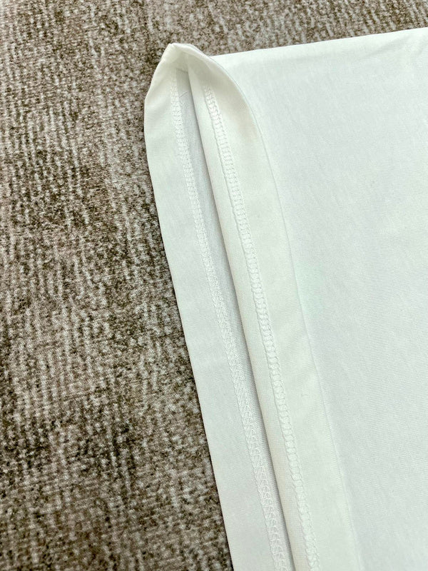 Three-quarter angle view of Amiri luxury piece style No.143