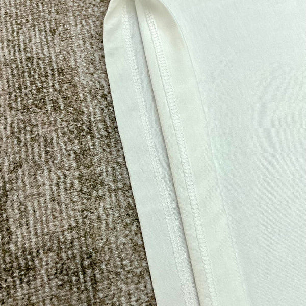 Three-quarter angle view of Amiri luxury piece style No.143