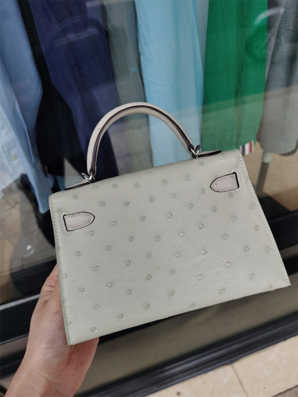 sleek top-handle bag detail view showing craftsmanship