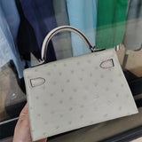  sleek top-handle bag detail view showing craftsmanship