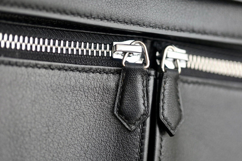 Side view of sophisticated structured handbag