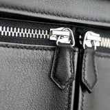 Side view of sophisticated structured handbag
