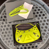 Handle and strap detail of classic everyday-luxe women's handbag – women's luxury handbag