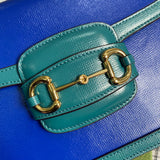 Handle and strap detail of modern chic women's handbag – women's designer-style accessory