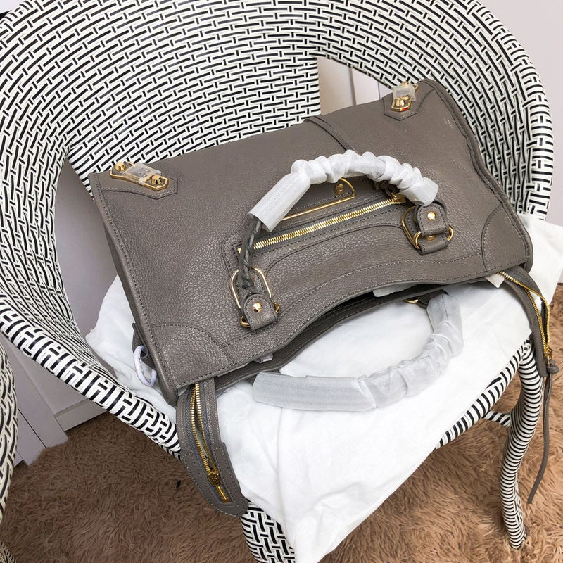 Styled lifestyle shot of structured statement women's handbag – women's designer-style accessory