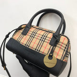 Ziva's Charm handbag – side angle view (one versatile size)