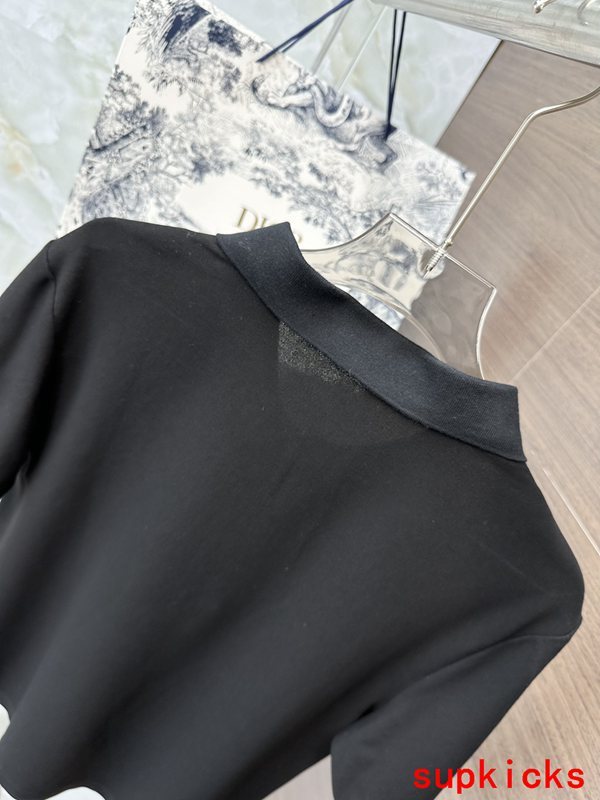 Close-up detail shot of Moncler luxury clothing with tailored silhouette
