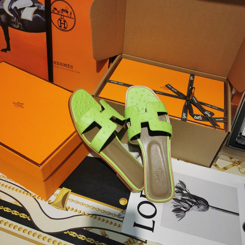 Hermès Nude Block Heel Sandals - Angled View