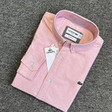 Side profile of Lacoste luxury clothing with logo-detail design