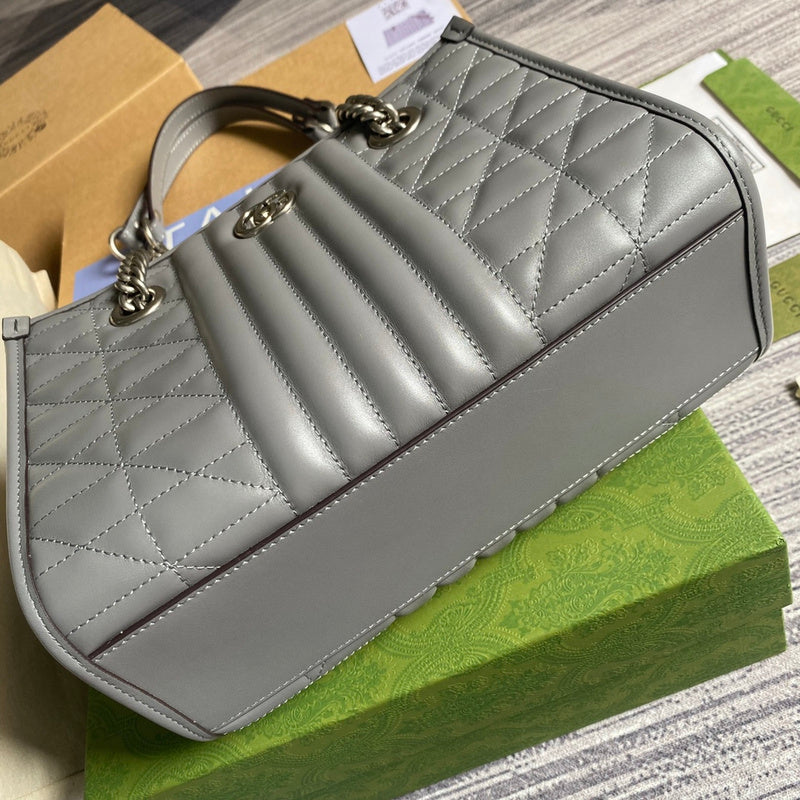 Back view of classic modern women's handbag – women's statement bag