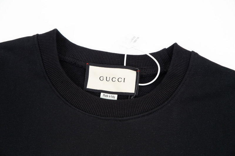 Close-up detail shot of Gucci luxury clothing with tailored silhouette