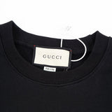 Close-up detail shot of Gucci luxury clothing with tailored silhouette