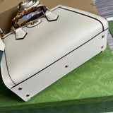 Back view of everyday-luxe polished women's handbag – women's statement bag