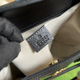 Side profile of signature elevated women's handbag – women's designer-style accessory