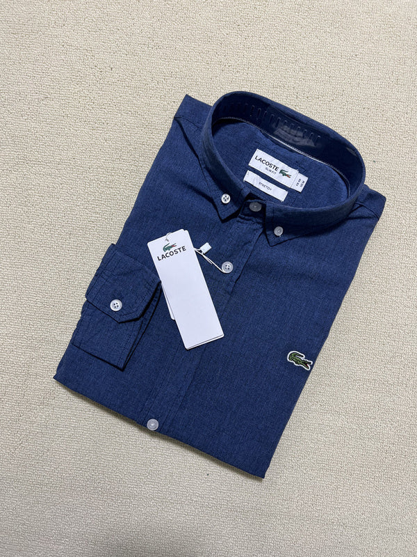 Close-up detail shot of Lacoste luxury clothing with logo-detail design