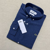 Close-up detail shot of Lacoste luxury clothing with logo-detail design