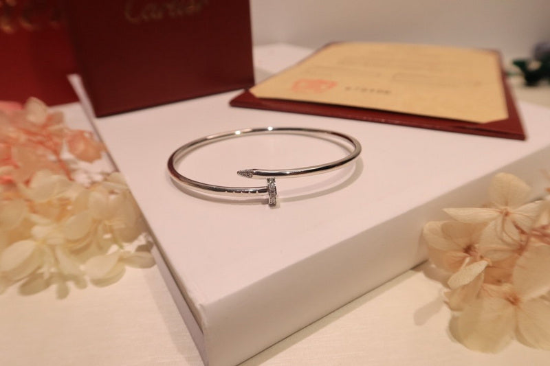 Angled view of Cartier unisex jewelry piece