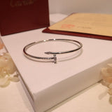 Angled view of Cartier unisex jewelry piece