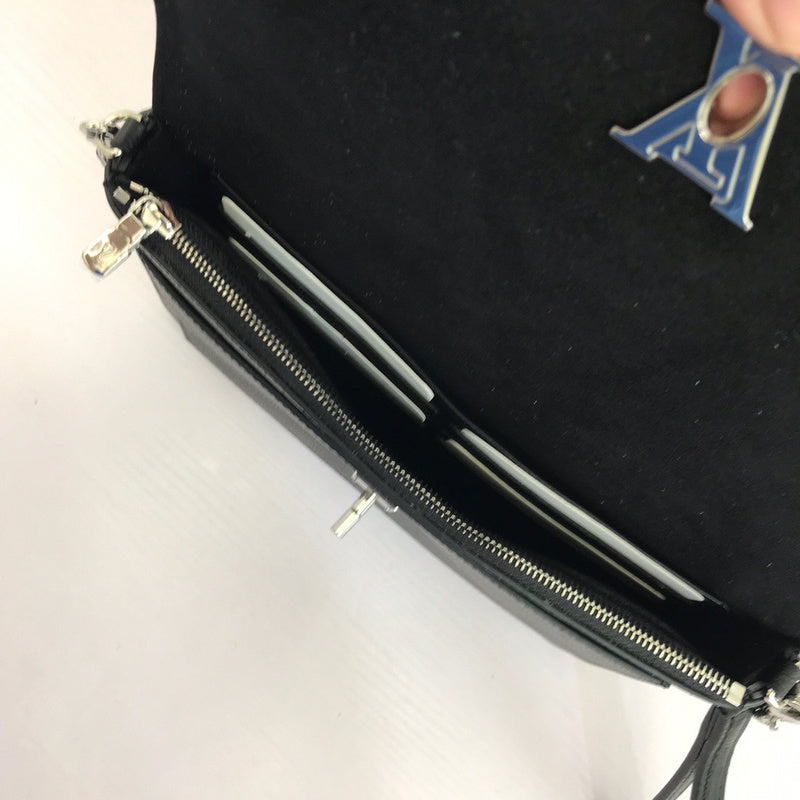 Front view of structured sleek women's handbag – women's everyday handbag