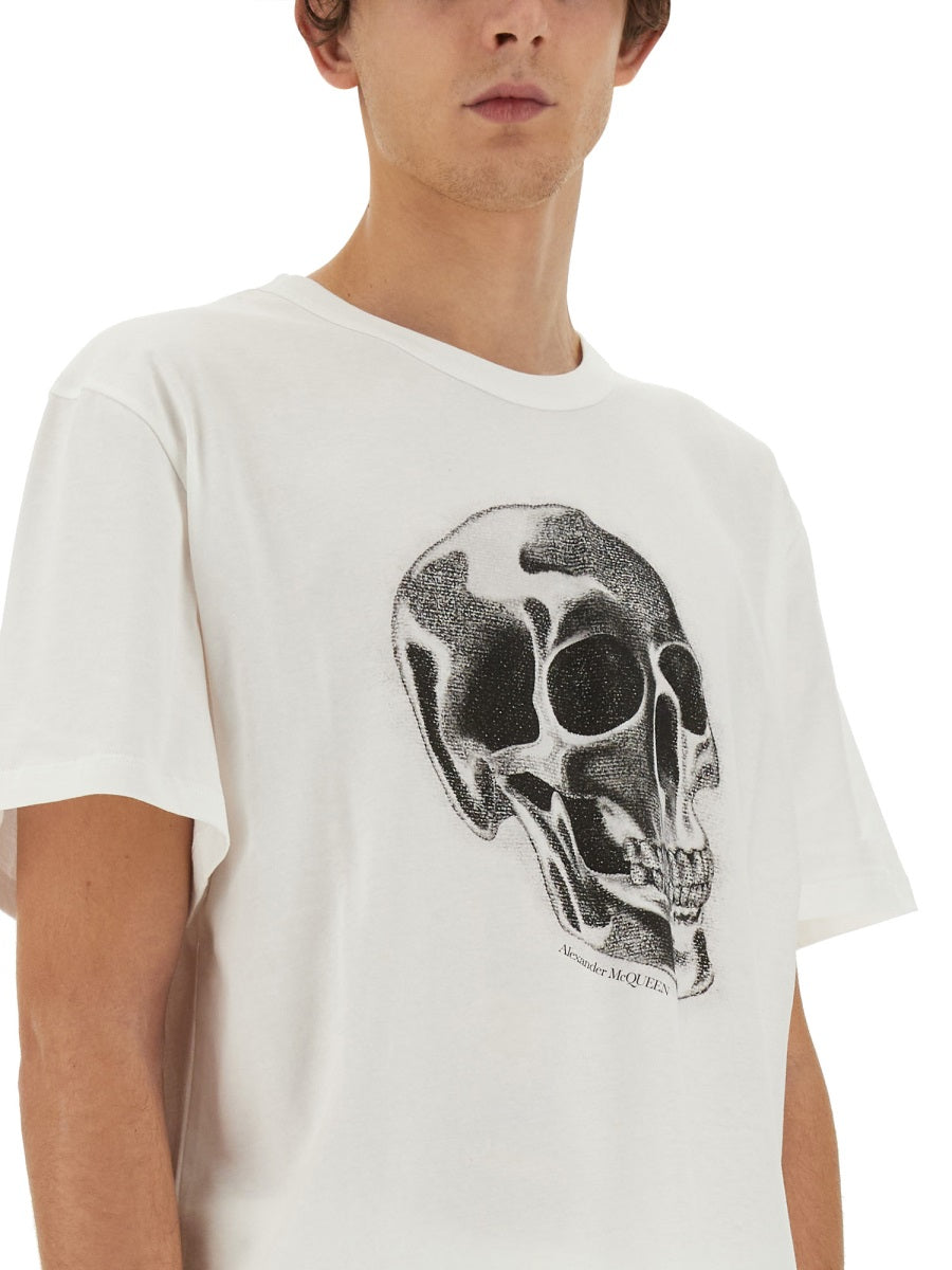 Close-up of Alexander McQueen tee shirts hardware and fine stitching